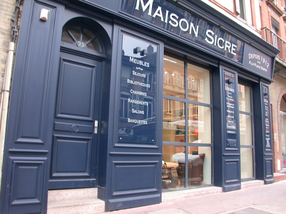 Porte sur mesure magasin SICRE Toulouse realisation Menuiserie Chomette